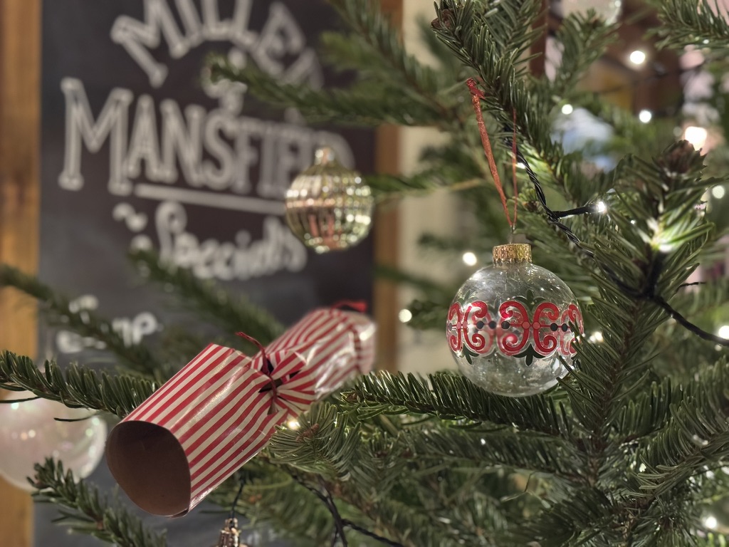 Baubles and a striped cracker on The Miller Christmas tree