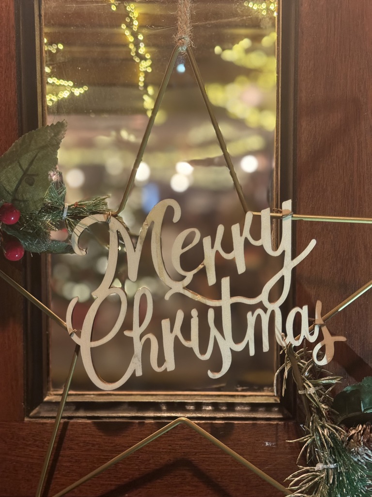 Merry Christmas decoration on The Miller door